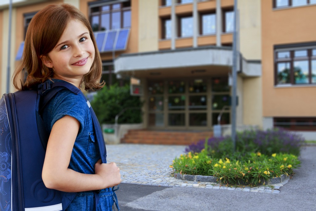 Back to school - portrait of  lovely schoolgirl