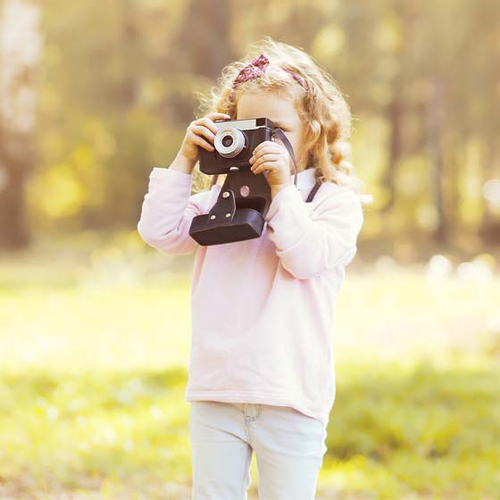 The trouble with so many family photos is that they look canned. You want these images to reflect you, your family and how you live. If you're not an avid outdoorsy family no need trucking it all the way to the Rockies to grab a shot. For more authentic snaps, choose a destination your family frequents often. Perhaps it's Westside Rec Centre, your favourite restaurant or an iconic community structure like Garrison Square. In a pinch, the local park or even alleys (think downtown with all that brickwork) provide an interesting backdrop. Just don't pose on any railway tracks. Not only is this dangerous, it's a ticketable offense!	
