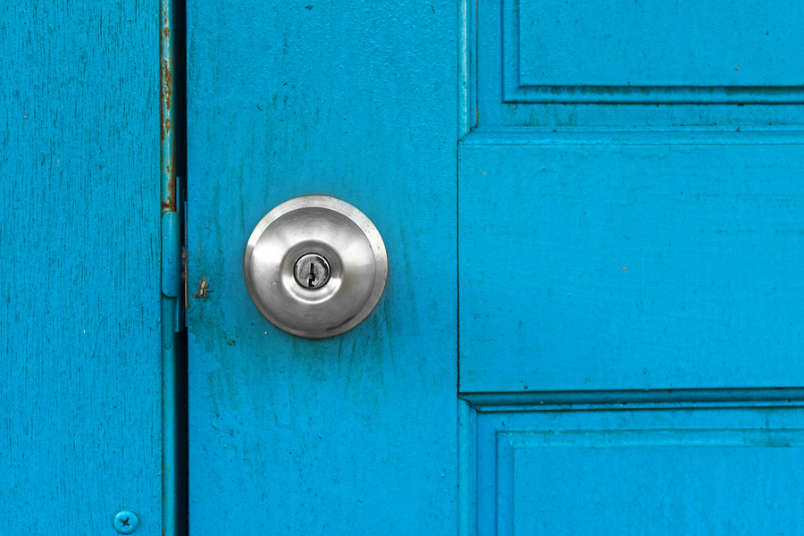 bigstock-Blue-old-door-with-silver-door-52360792