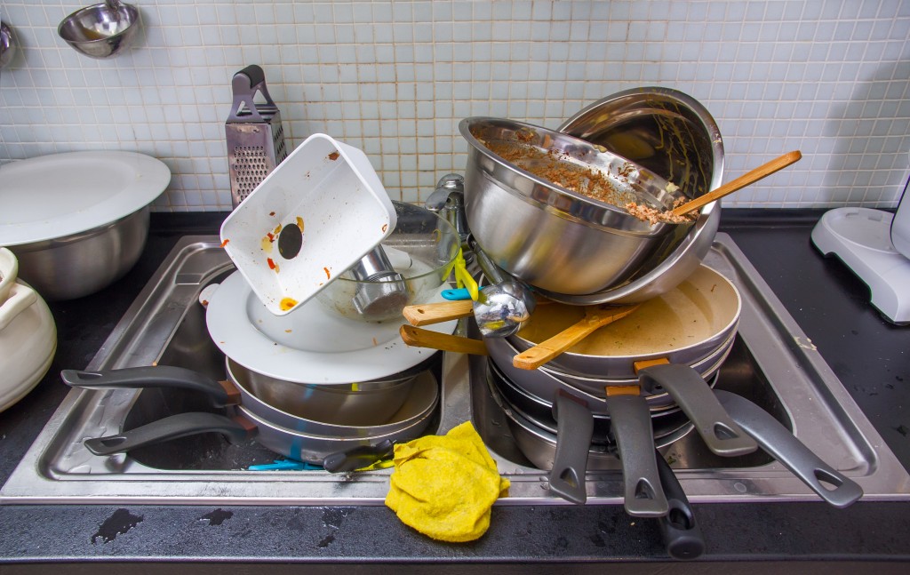 Heap of dirty utensil on the kitchen