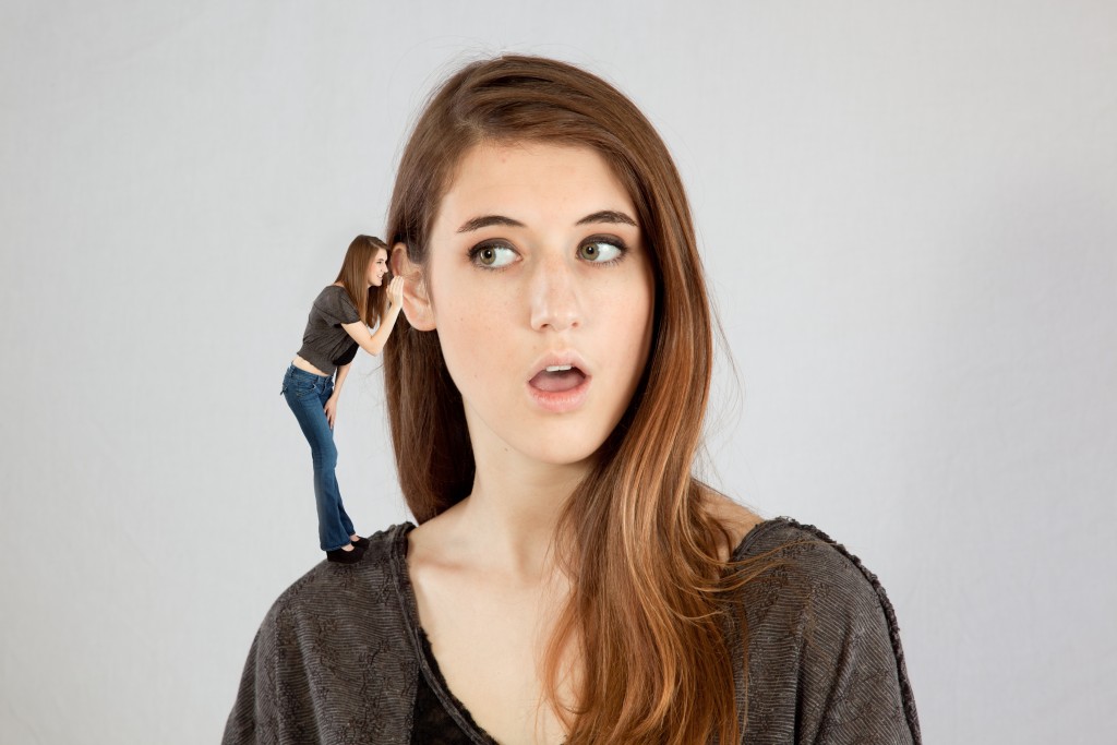 Woman listening to herself