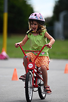 GirlLearningToBike