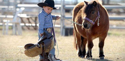 the_cutest_lil_cowbpy_ever_at_10_Great_Summer_Rodeos_and_Country_Fairs_in_Calgary