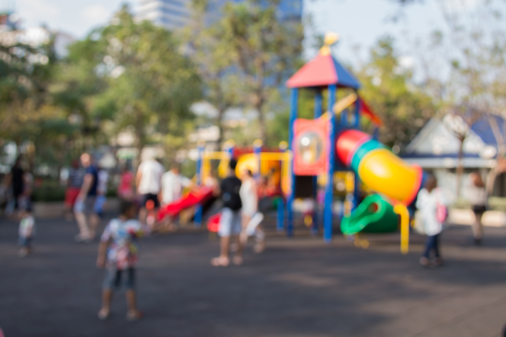 Young mom in schoolyard