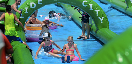 We never could resist a Slip'N Slide, and this one seems awesome. There's music, a party, and of course, the largest water slide you've ever seen. Great for the whole family. Go for a single slide or slide the day away.