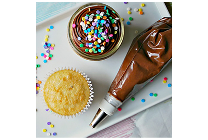 Raise the activities bar at your next birthday party by teaching the kids how to make these cupcakes in a jar. 