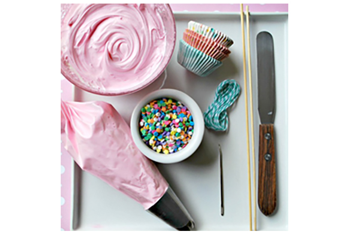 Start small with a mini birthday cake, then go big when it comes to the decorating. Kids will have a blast learning how to ice a cake. 