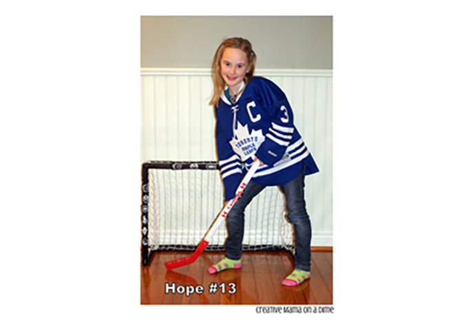 Junior jocks will get a moment in the spotlight as they pose for their own personal hockey card. 