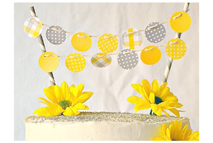 Guests will circle around the pretty cake to figure out how you make this gorgeous topper.