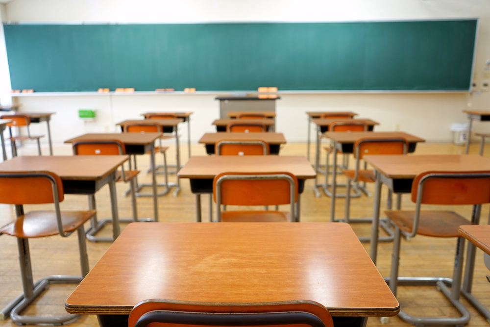 shutterstock_356921618 When You Disagree with Your Child's Teacher or Coach - SavvyMom