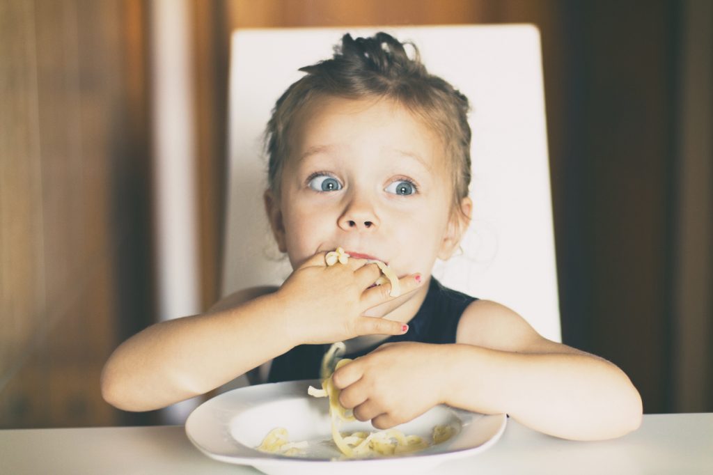 Child eating dinner
