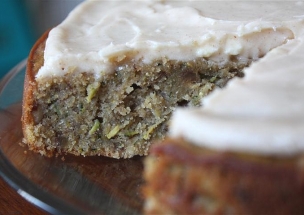 slice of zucchini pecan cake with frosting