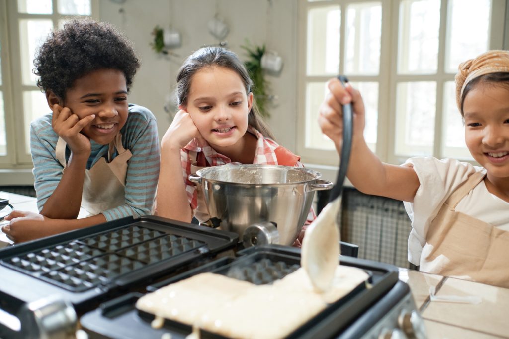 Children learning to cook waffles Batch Cooking Breakfast - SavvyMom
