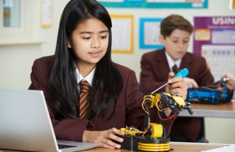 Pupils In Science Lesson Studying Robotics