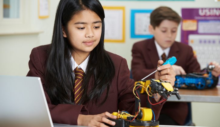 Pupils In Science Lesson Studying Robotics