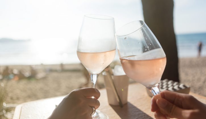 Raising a glass wit rose wine