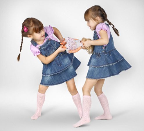 twins_fighting_over_doll