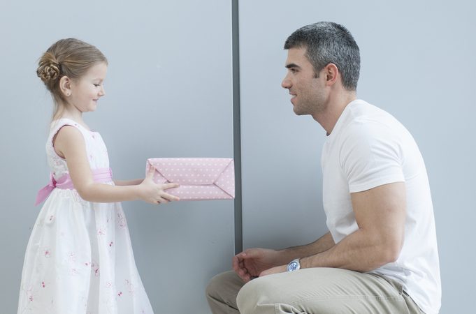 Child Giving Gift