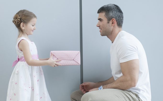 Child Giving Gift