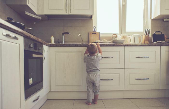 Child Reaching Up for Food