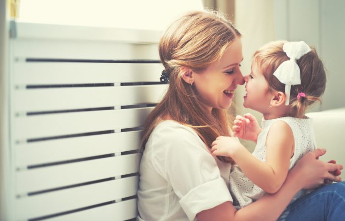 Mother Holding Toddler Daughter