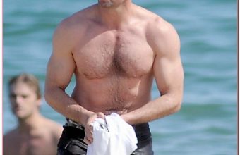 Looking More Like A 'Baywatch' Stud Hugh Jackman Hits Beach With His Family