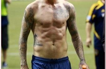 Shirtless Soccer Star David Beckham Heads Off Field After Match