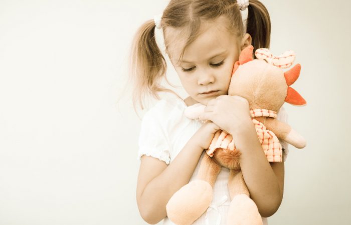 sad-girl-with-her-stuffed-animal