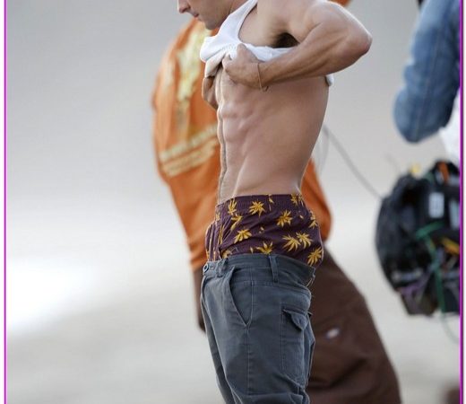 Zac Efron Hits The Beach For "We Are Your Friends"
