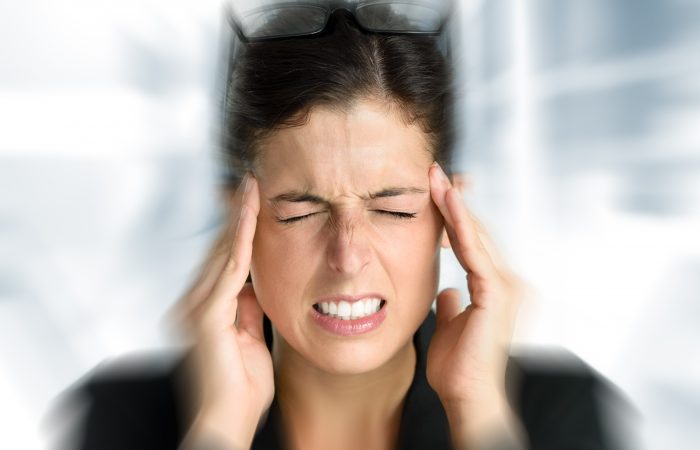 Business woman stress and headache