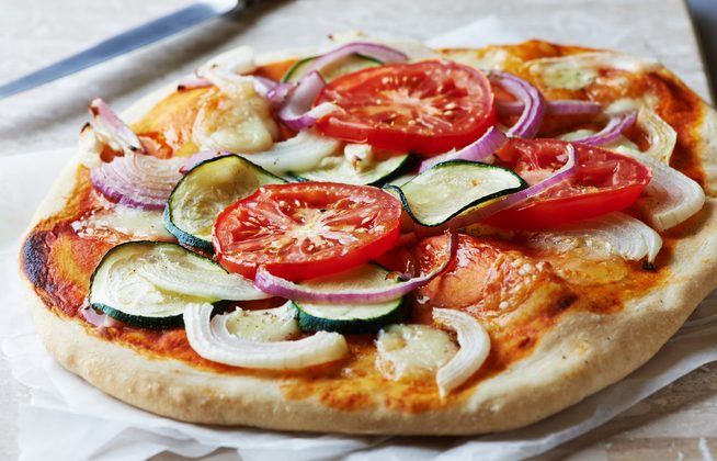 Quick and Easy Vegetarian Pizza with tomato, onion and zucchini