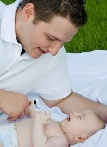 Dad-talking-to-baby-217x300