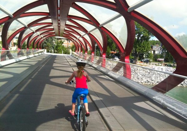 Child-cycling-over-pedestrian-bridge