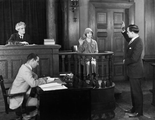 stock-woman-testify-court-2