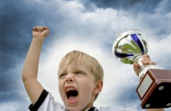 kid-winning-with-trophy