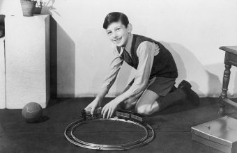 BOY WITH TRAIN SET