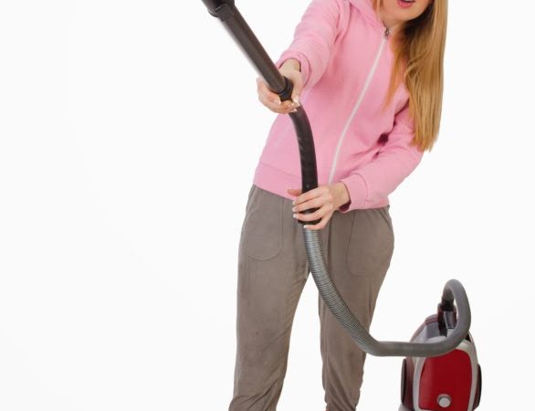 kozzi-young_woman_with_vacuum_cleaner_on_white-586x886