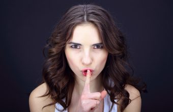 young woman hush