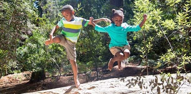kids-leaping-from-log-612x300