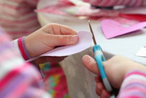 Child Making Valentine Craft