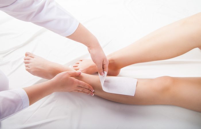 Woman Having Legs Waxed