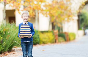 Kid Holding Lunchbox Outside