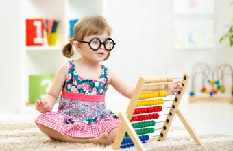 Smart Kid Playing with Educational Toy