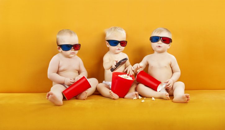Kids Watching 3D Movie with Popcorn