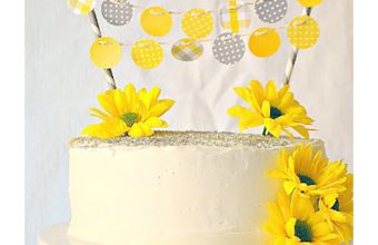 Baby Shower Cake With Paper Banner and Fresh Flowers